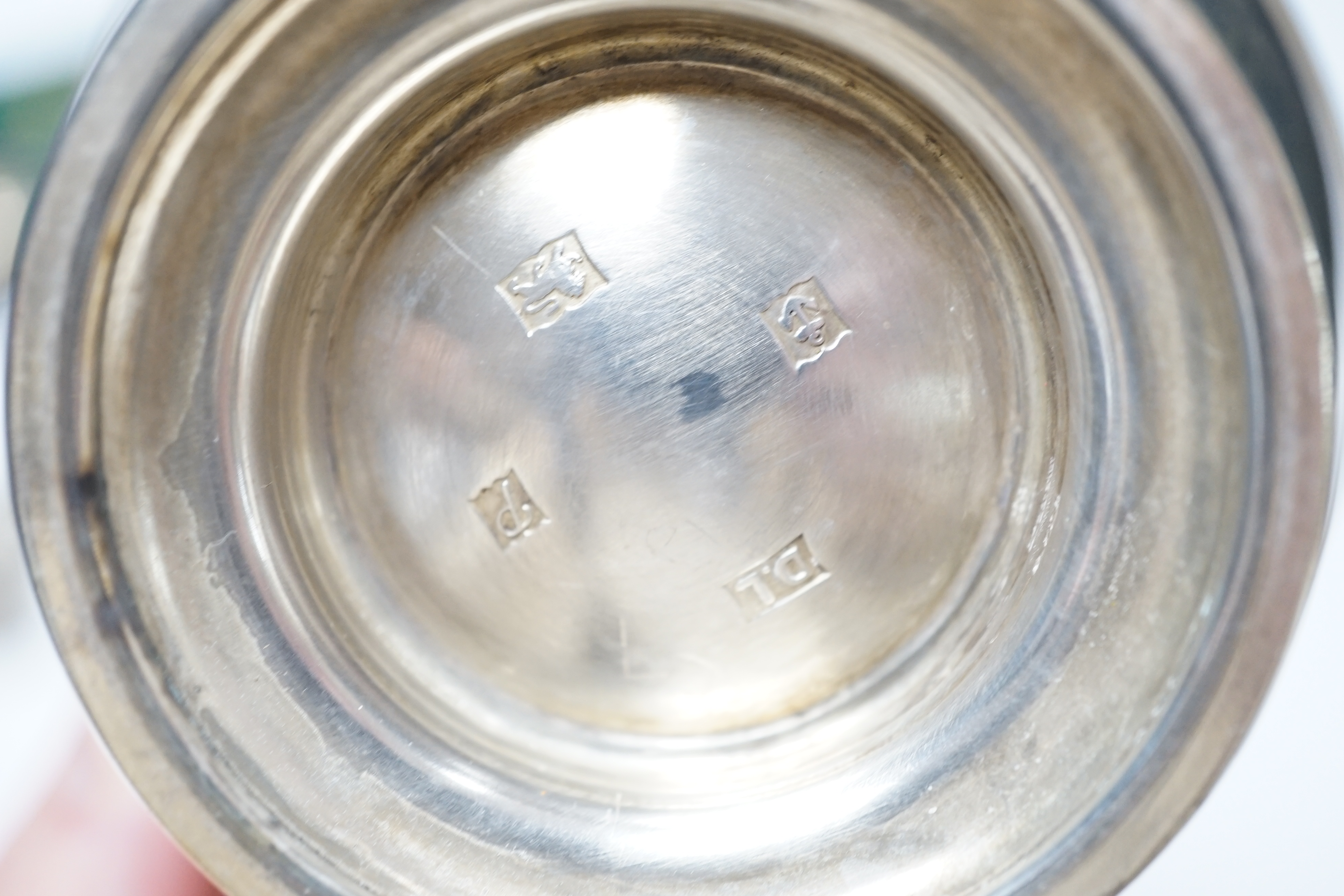 A group of small silver including Edwardian silver oval sugar basket, a modern silver cream jug and sugar bowl, five assorted condiments, a silver sifter spoon and a late Victorian scent bottle, 56mm.
